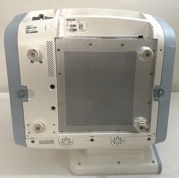 Rear view of pre owned Philips Respironics V60 non invasive ventilator on stand with vented metal panel from PHENTERSALES medical equipment