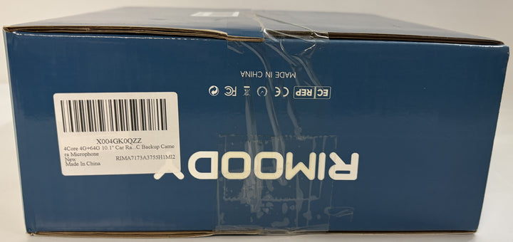 Blue Rimoldi cardboard box with a white barcode label and printed product information, shown on its side with the branding upside down