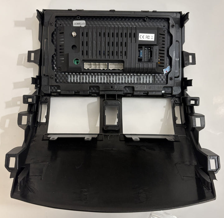 Rimody black Android car stereo dashboard fascia rear assembly for Ford Fiesta 2009 to 2017 with mounting brackets, vents, and wiring connectors