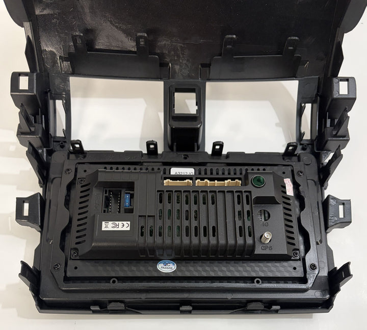 Rear view of Rimoody Android car stereo for 2009 to 2013 Toyota Corolla, showing black housing, ventilation slots, ports, and mounting brackets