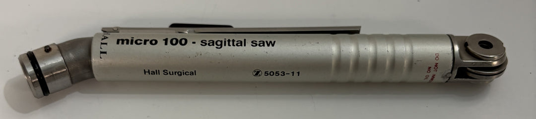 Micro 100 sagittal saw with visible branding on a white background