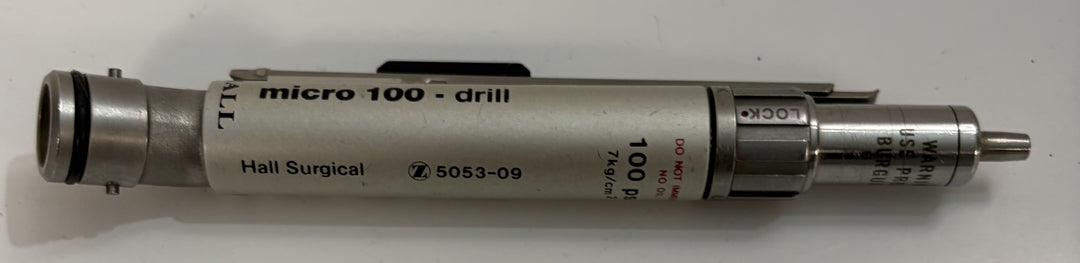 Surgical micro drill with visible branding on a white background