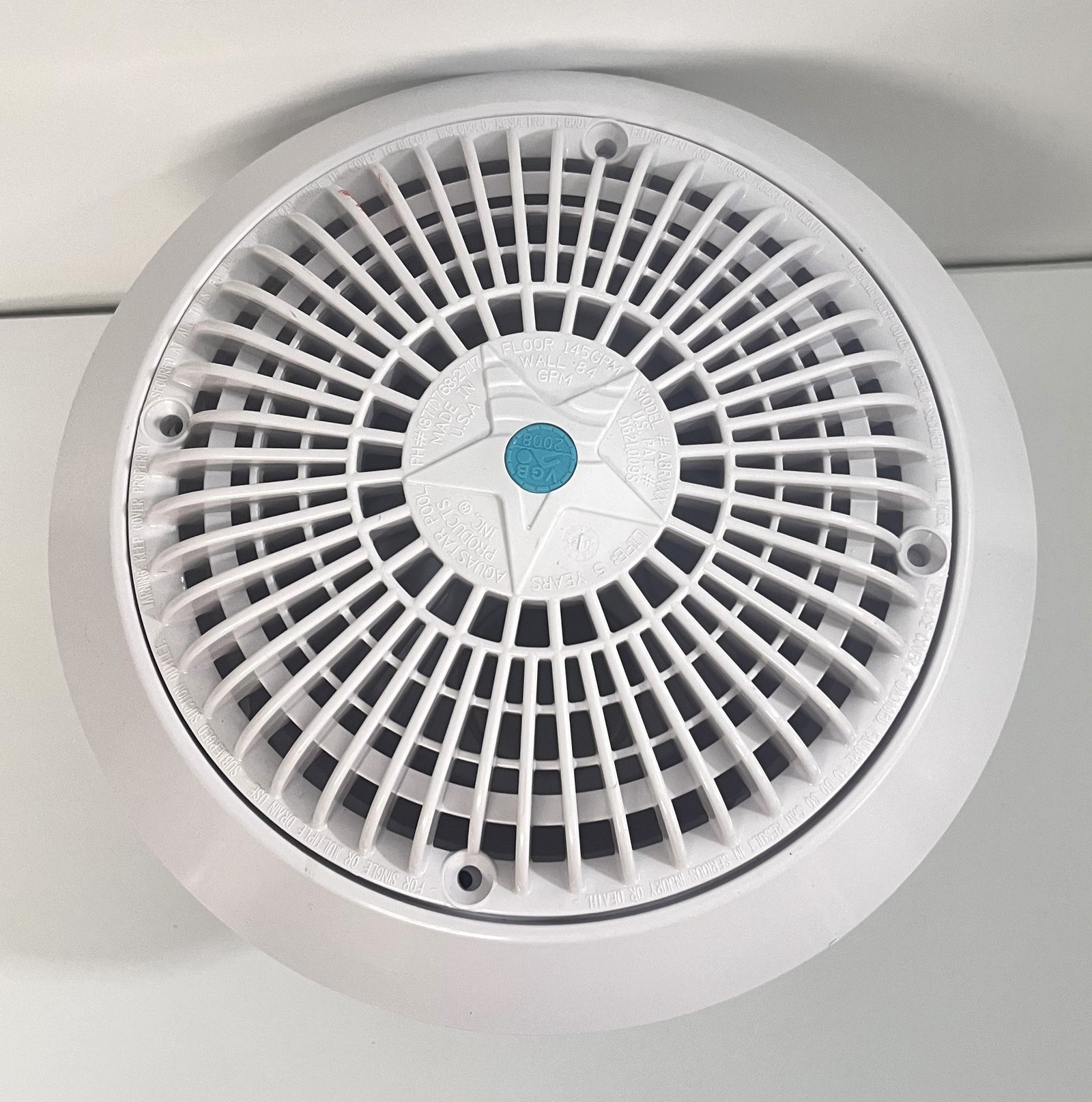 AquaStar VGB Series 8-inch round submerged suction outlet drain cover with anti-entrapment design.