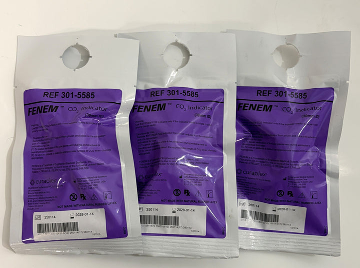 Three sealed single-use Fenem CO2 indicator packets with purple labels and product information, supplied by Curaplex, displayed on a white background.