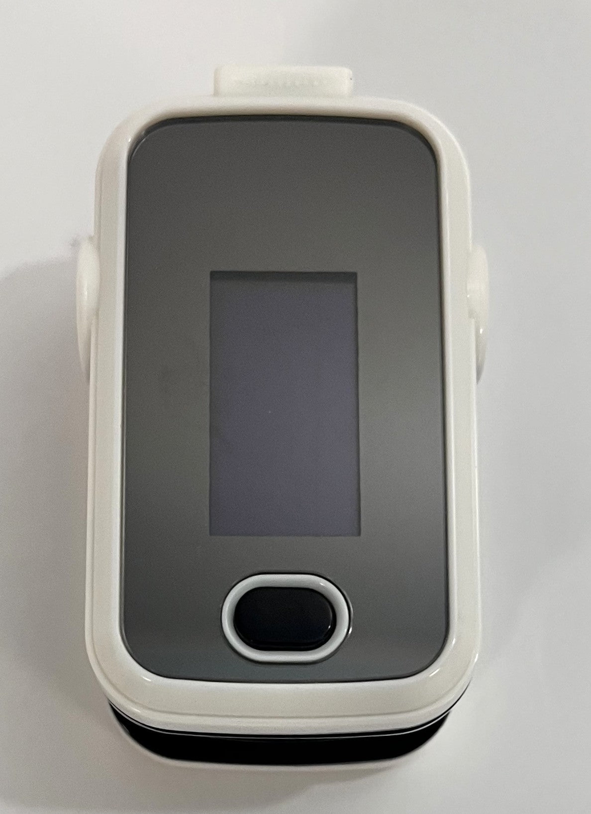 Pulse Oximeter A310 with dual-color OLED display, compact white design, and battery indicator.