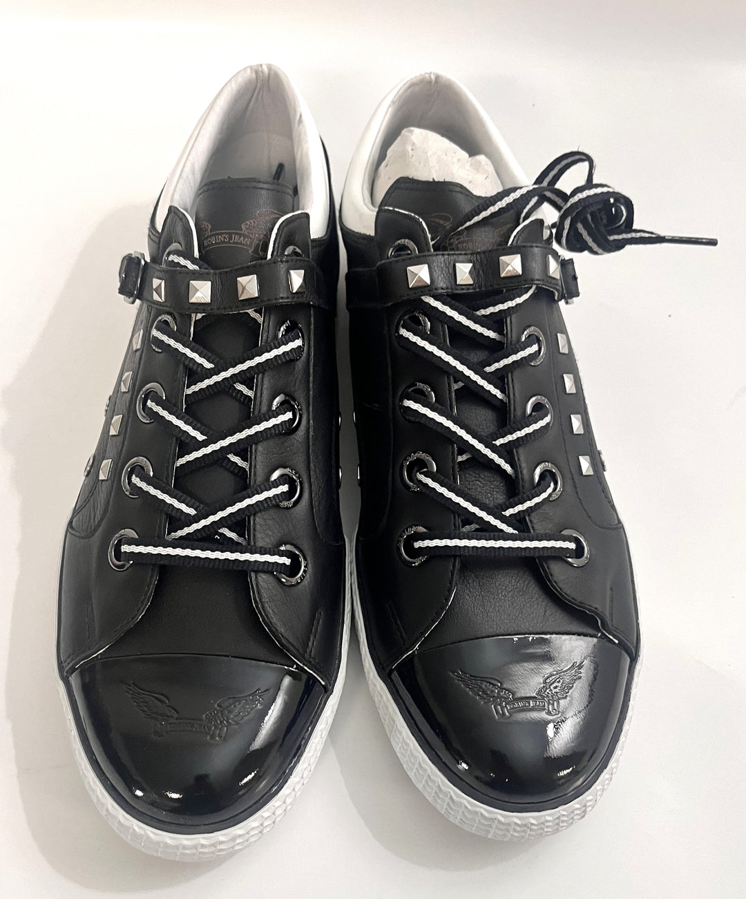 Men's Fashion Nathan Black Sneaker: sleek black design with a low profile, lace-up closure, cushioned insole, and durable rubber sole.