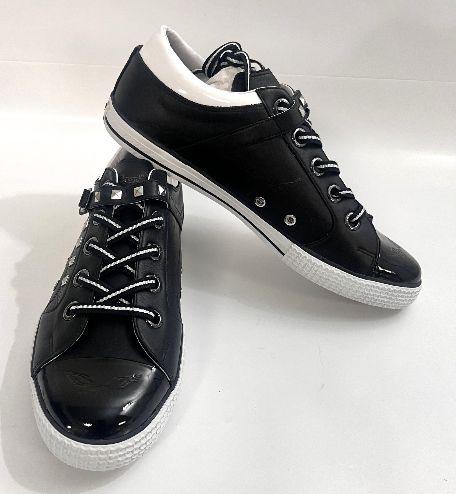 Men's Fashion Nathan Black Sneaker: sleek black design with a low profile, lace-up closure, cushioned insole, and durable rubber sole.