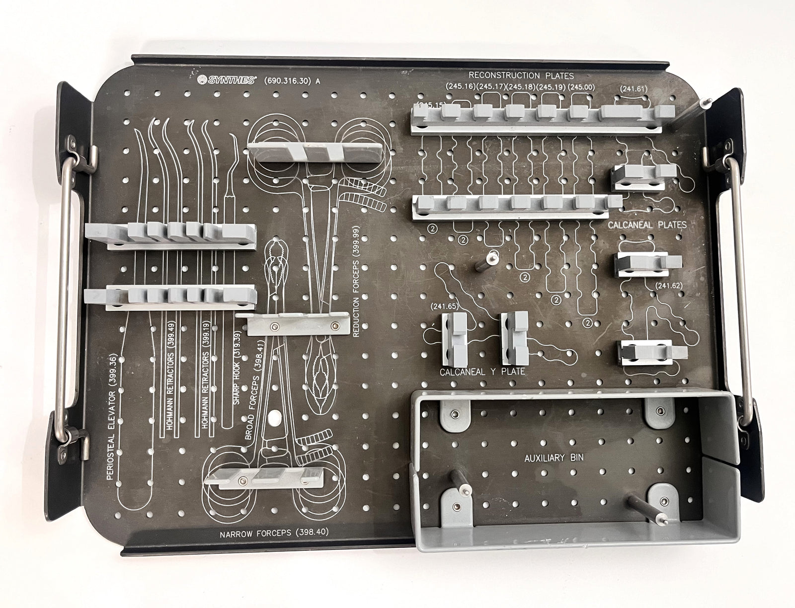 Synthes Instrument Tray 690.316.30, stainless steel with compartments for surgical tools.