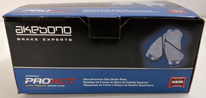 Rectangular box packaging for Akebono ProACT ceramic disc brake pads, featuring blue and black color scheme with product branding and images of brake pads on the front.