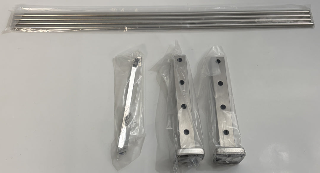 Set of ASI stainless steel hardware including two vertical support brackets, a smaller angled bracket, and a sealed package of wall mount rods for shelving installation.