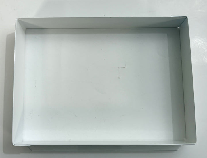 Metallic rectangular tray on a white background
