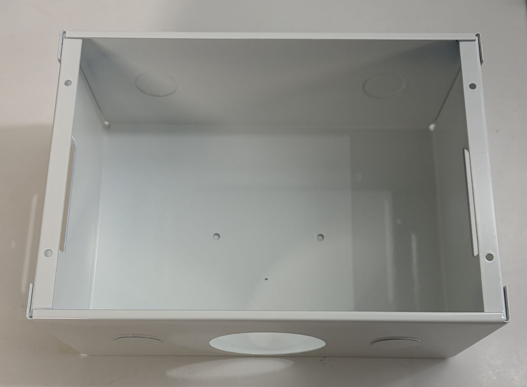 Metallic box with circular cutouts on a white background
