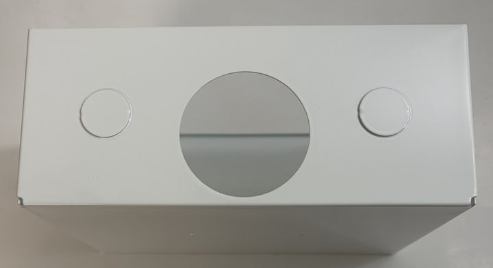 White rectangular box with circular cutouts on a gray background