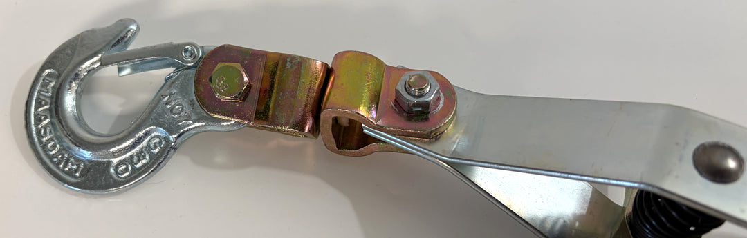Metallic tool with a hook and lever mechanism on a white background