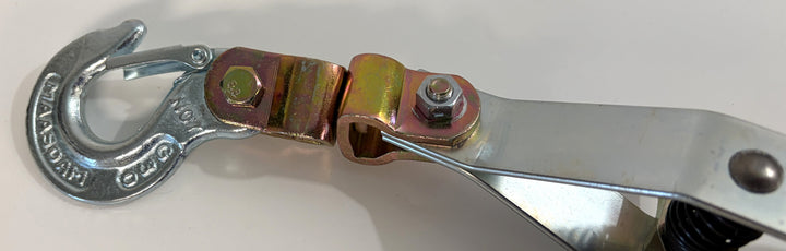 Metallic tool with a hook and lever mechanism on a white background