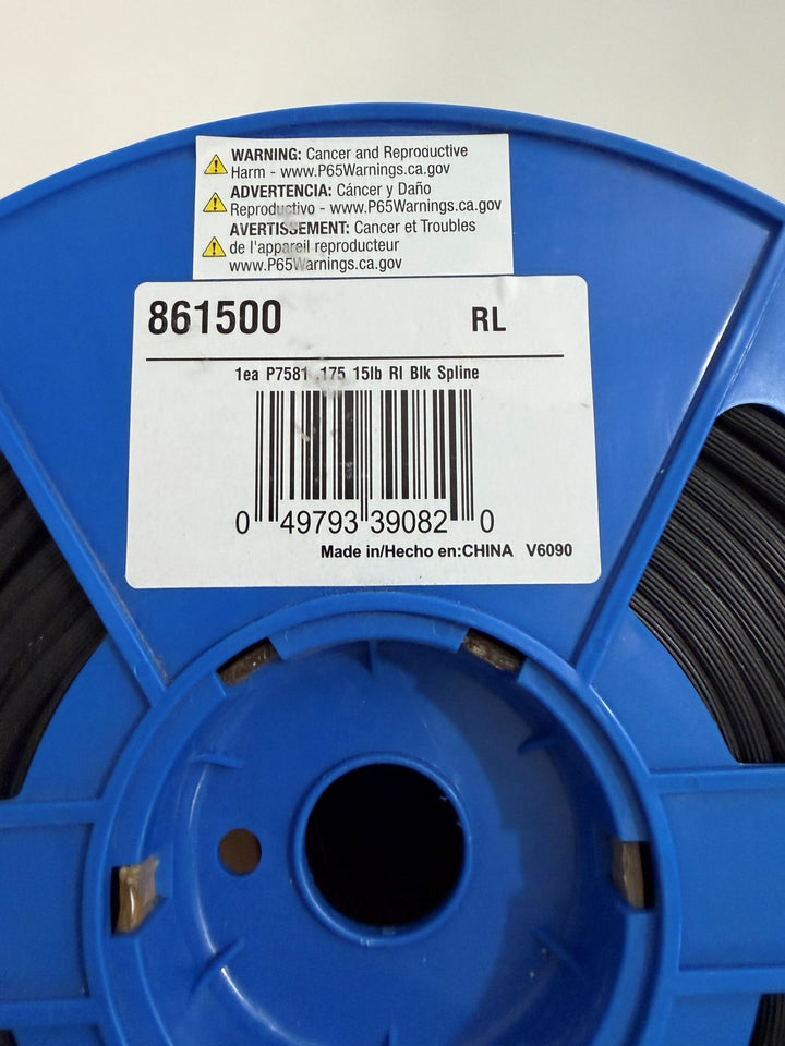 Blue spool with black wire and a label on a white background