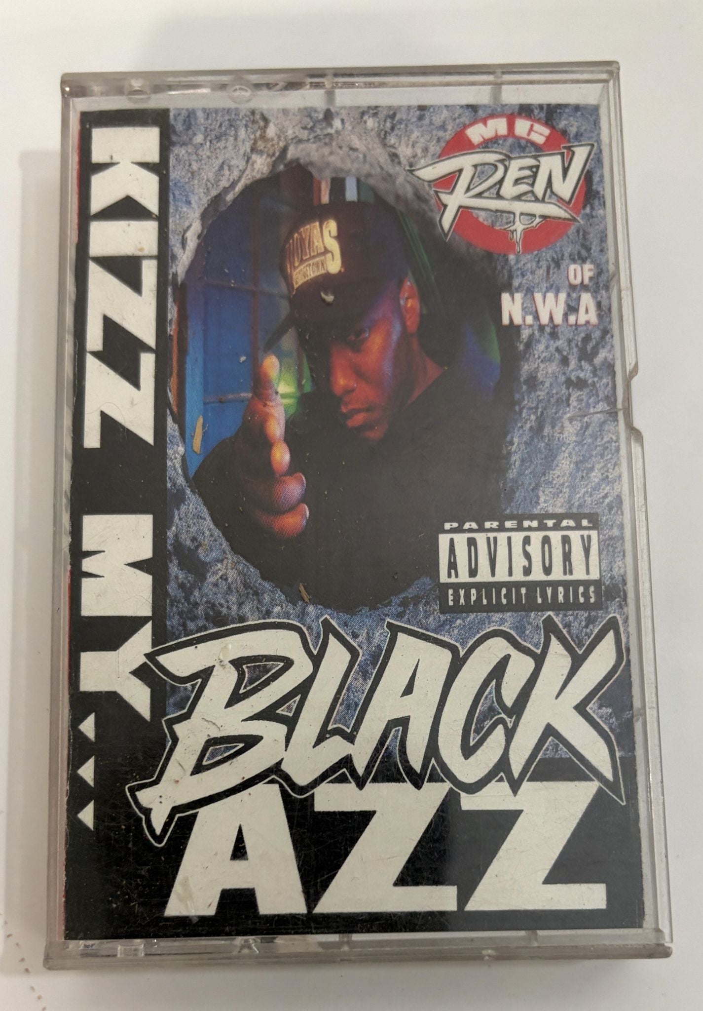 Pre-owned MC Ren cassette tape titled "Kizz My Black Azz" by Priority Records featuring bold text, explicit content warning, and artist portrait on cover.