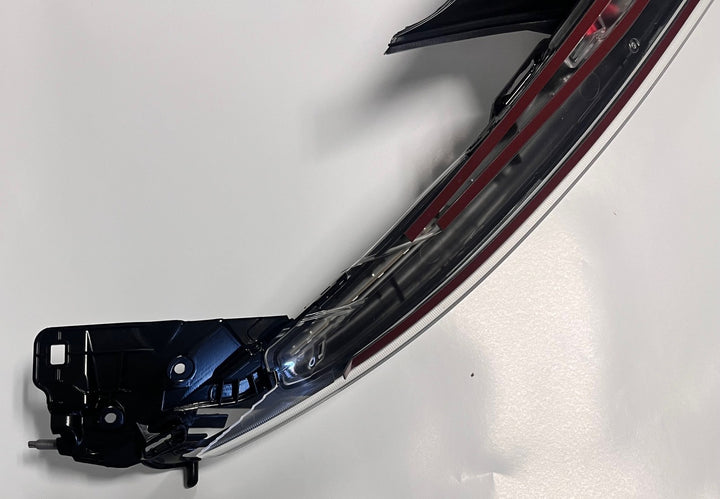 Front view of Lucid P11-L130K1-08 Nose Lamp SAE with Platinum and Polish Foil finish, OEM 2022–2025.
