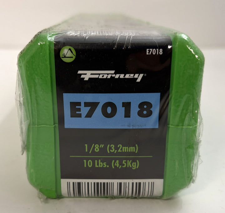 Compact green plastic container holding Forney welding electrodes labeled E7018, showing size and weight details on the front panel wrapped in clear plastic.