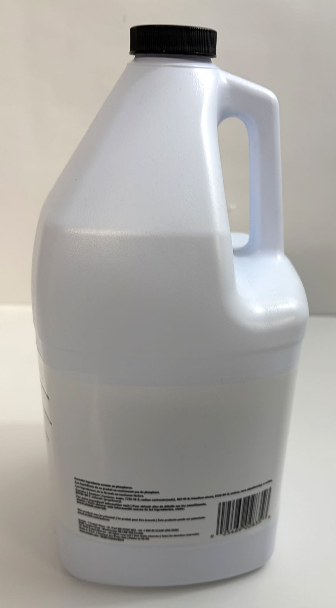 White plastic jug with black screw cap and handle, featuring a barcode and small printed label, likely a wholesale product container from Ecolab for industrial or commercial use.