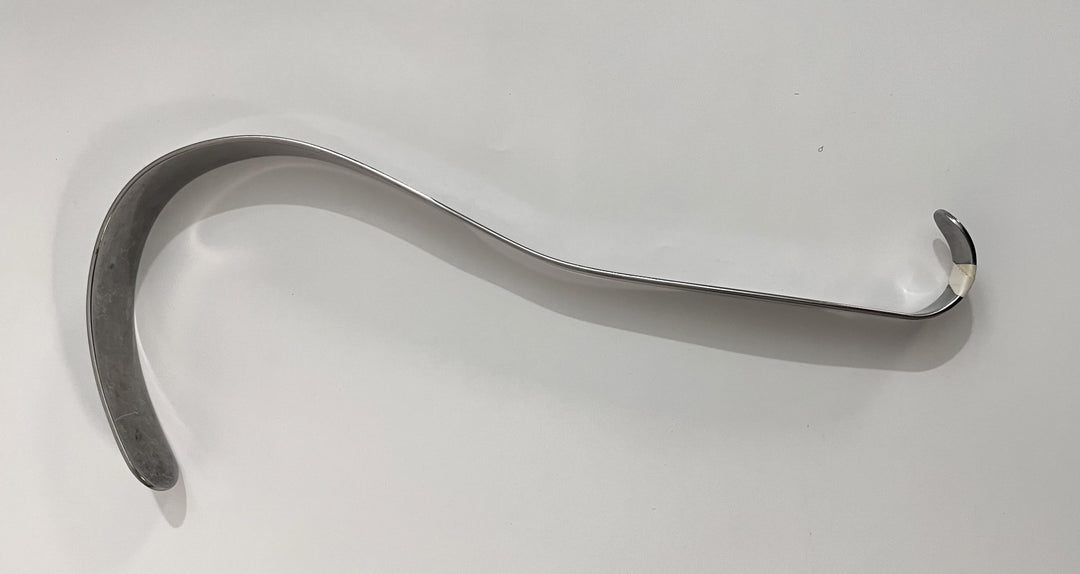 Stainless steel retractor by House of Instruments, designed for precise surgical retraction. Durable, easy to clean, and ergonomic for comfort.