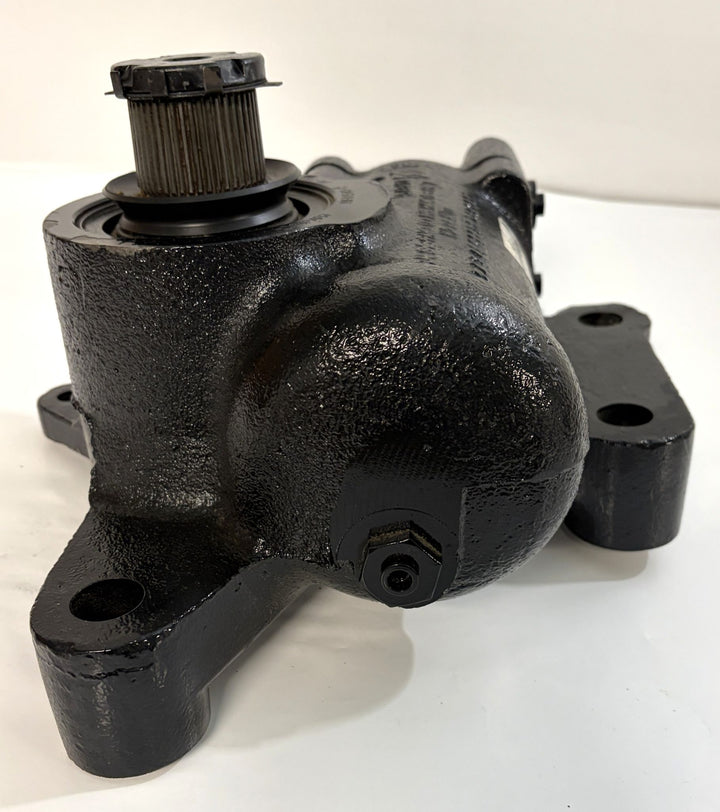 Close-up of a black, textured metal steering gear component with mounting holes and a cylindrical control shaft, suitable for industrial or automotive use by Sheppard.