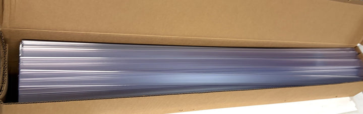 Long clear plastic shelf label holders neatly stacked inside an open brown cardboard box, designed for retail or business display, by Siffron.