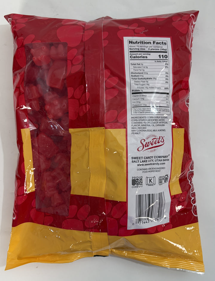 Back view of a large clear-red and yellow bag of Sweet Candy Company cinnamon bear candies showing nutrition facts and ingredient details on a white label.