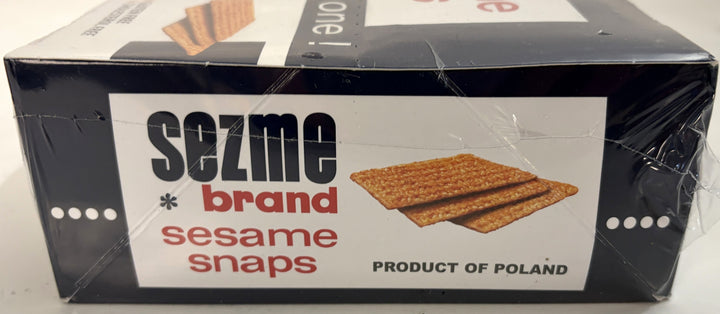 Rectangular box of Sezme brand sesame snaps featuring an image of three crisp sesame snack bars and labeled as a product of Poland.