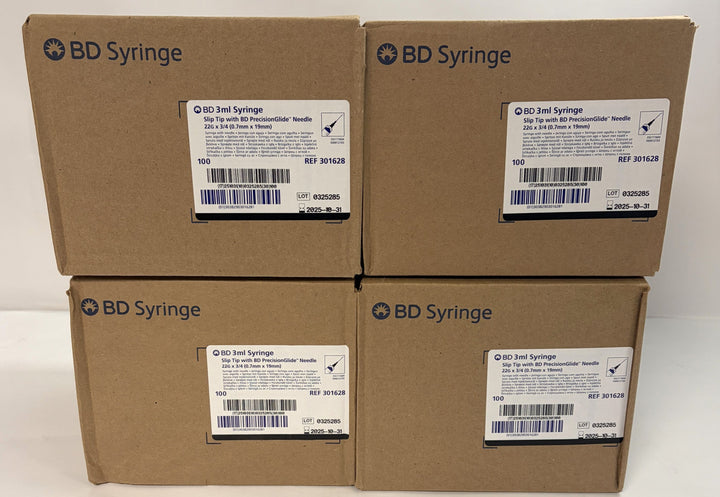 Four stacked cardboard boxes labeled BD Syringe, each showing product details for 3mL syringes with 22G needles intended for veterinary and training applications.