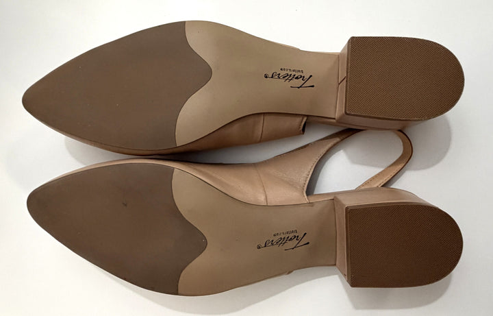 Brown shoes with visible brand name on a white background