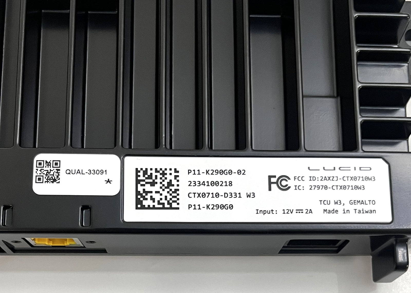 Lucid P11-K290G0-02 Telematics Control Unit, highlighting its compact, advanced design and features.