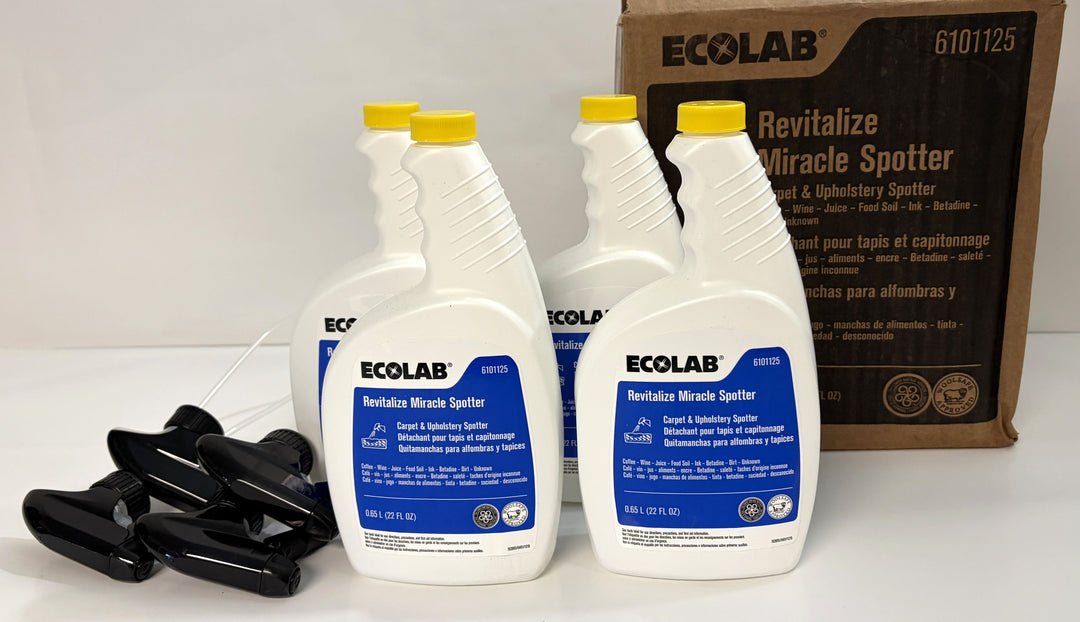 Four white plastic bottles with blue labels and yellow caps of Ecolab cleaning spotter displayed next to a brown cardboard box featuring Ecolab branding on a white surface.