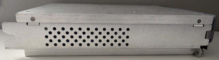 Metallic electronic device with perforated design on a gray background
