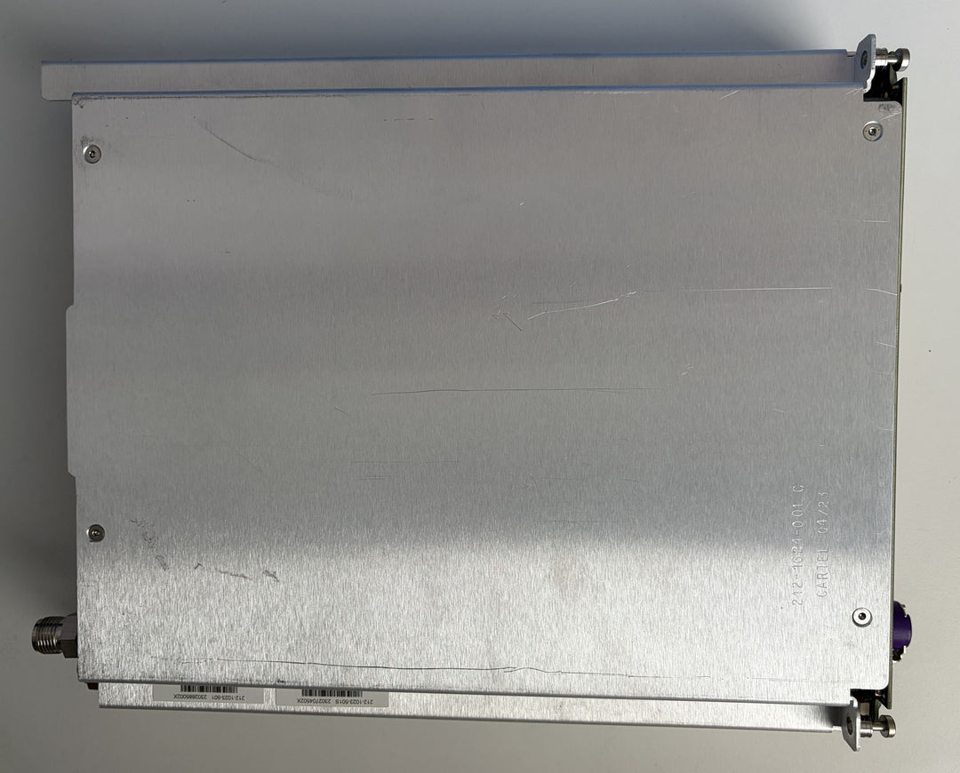 Metallic rectangular object with screws on a gray background