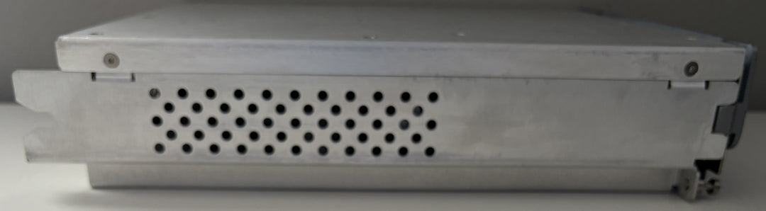 Metallic appliance with a perforated design on a gray background