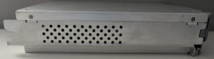 Metallic appliance with a perforated design on a gray background