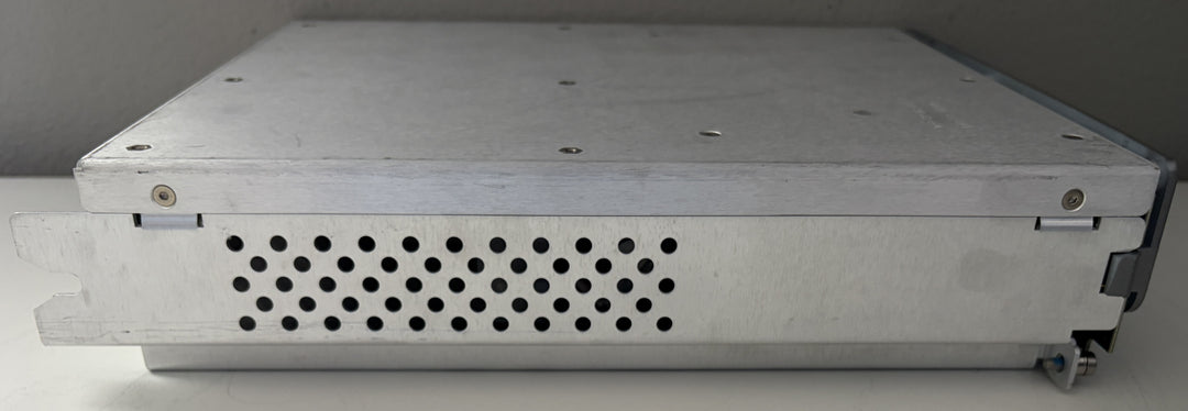 Metallic server rack with perforated design on a gray background