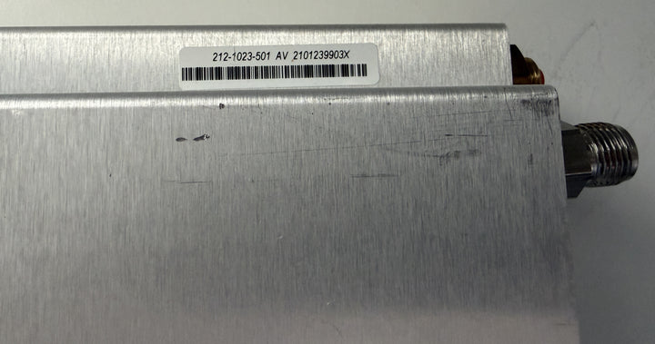 Metallic device with a label on a white background