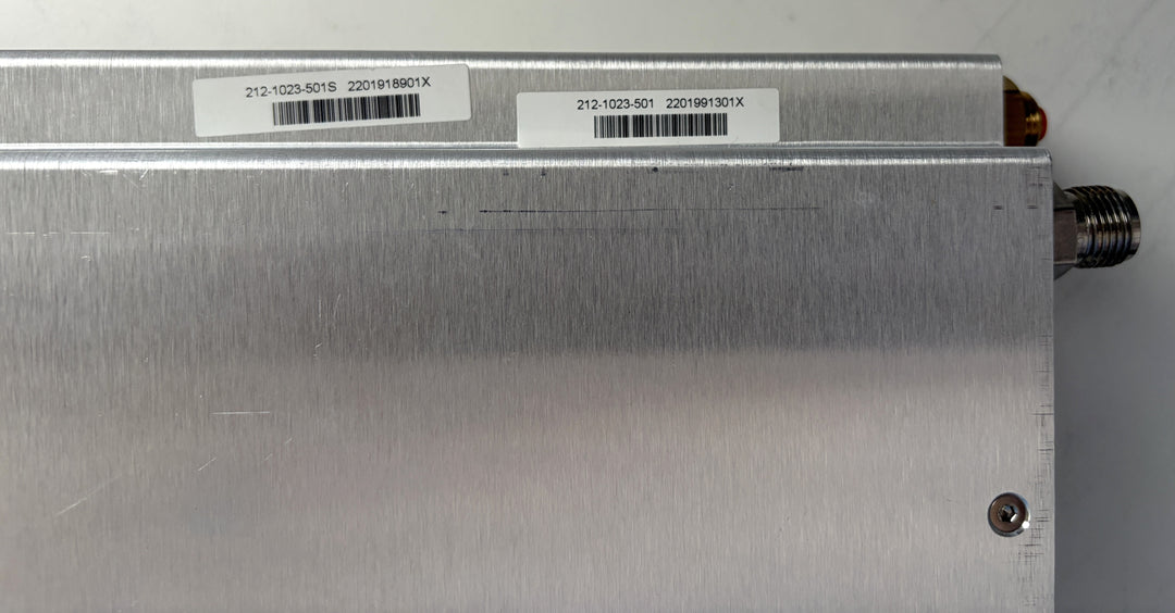 Metallic device with barcodes on a gray background