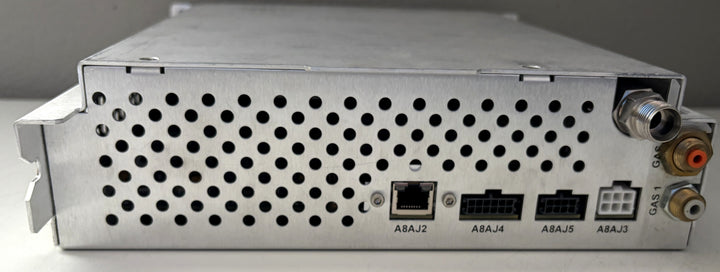 Back view of a network switch with multiple ports on a gray background