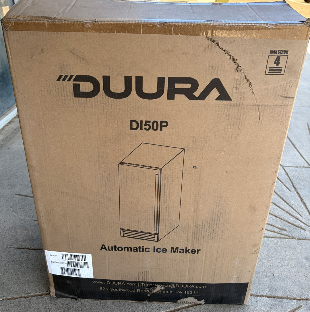 Cardboard box featuring Duura branding and model DI50P, with a simple line drawing of an automatic ice maker and handling labels on an outdoor surface.