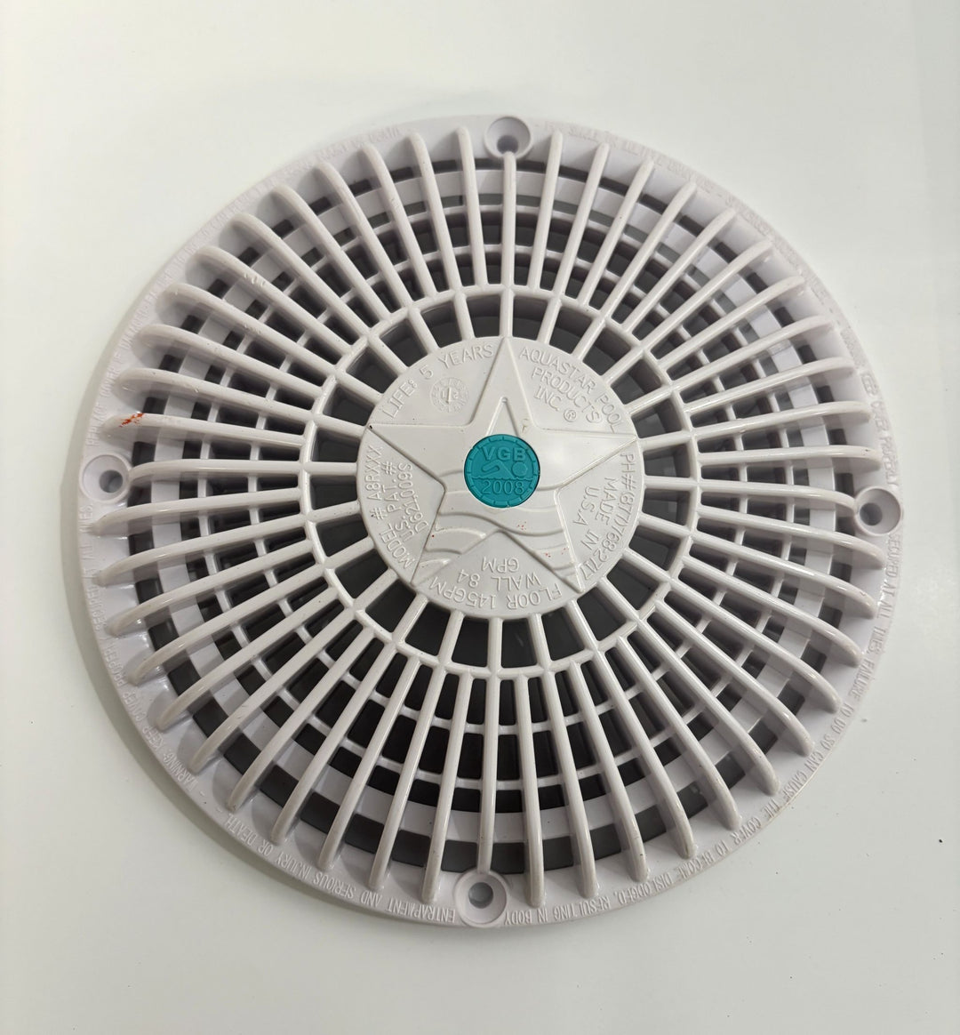 Round white pool suction outlet drain cover with a star design and AquaStar branding in the center, designed for safety and compliance with VGB-2008 standards.