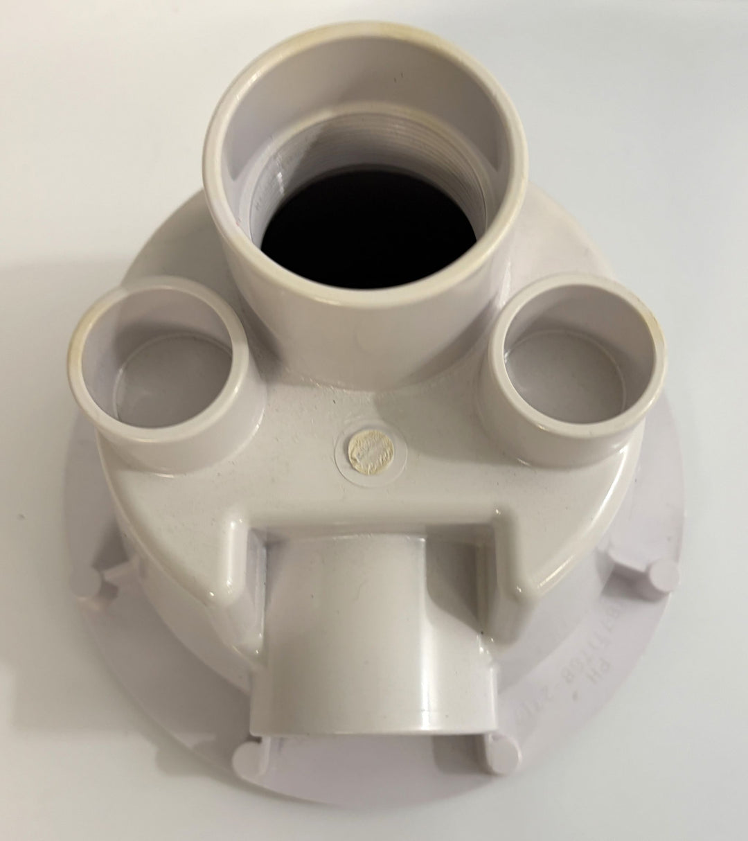 White plastic AquaStar pool suction outlet drain cover component showing multiple circular openings and a central threaded pipe connection against a plain background.