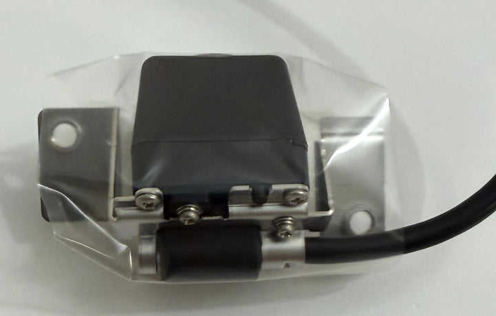 TESLA rear view backup camera and harness assembly with mounting bracket and attached cable, packaged in clear protective plastic wrap.