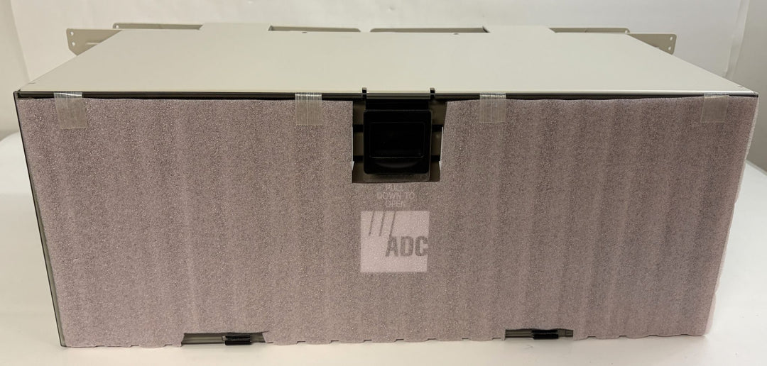 Gray metal ADC optical distribution frame chassis block with front latch and PHENTERSALES branding, designed for industrial electrical and communication applications.