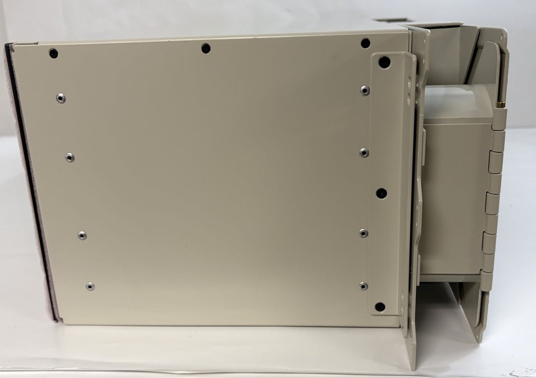 Side view of a beige TE Connectivity optical distribution frame chassis block new, featuring a sturdy metal construction, offered by PHENTERSALES for industrial applications.