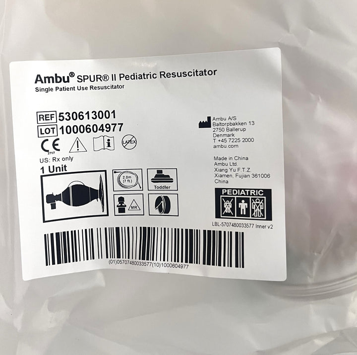 Ambu 530613001 SPUR II Pediatric Resuscitator with mask, oxygen port, and single-use design.