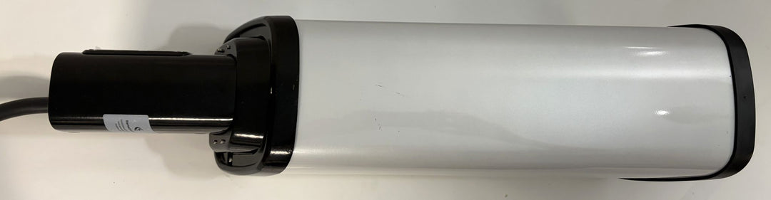 Sleek silver and black SemaConnect level 2 electric vehicle charging unit with attached cable, designed for commercial and industrial electric car charging use.