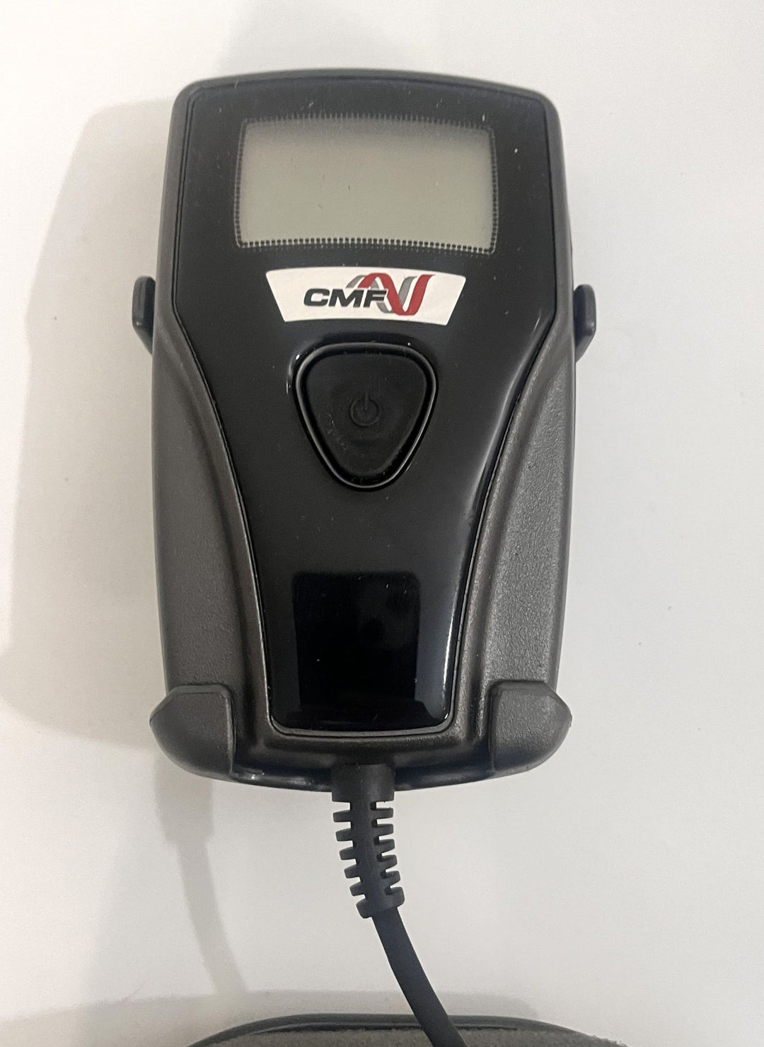 CMF OL1000 Bone Growth Stimulator with case and book, a non-invasive device for bone healing therapy.